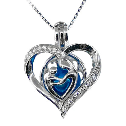 Sterling Silver Mother & Child Cage w/ Rhinestones